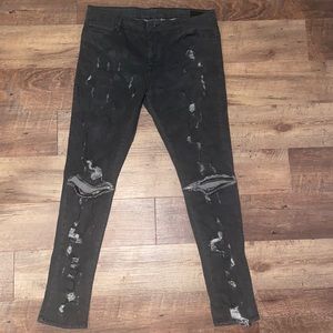 Asos Super Skinny Jeans With Abrasions And Knee Rips In Black Coating